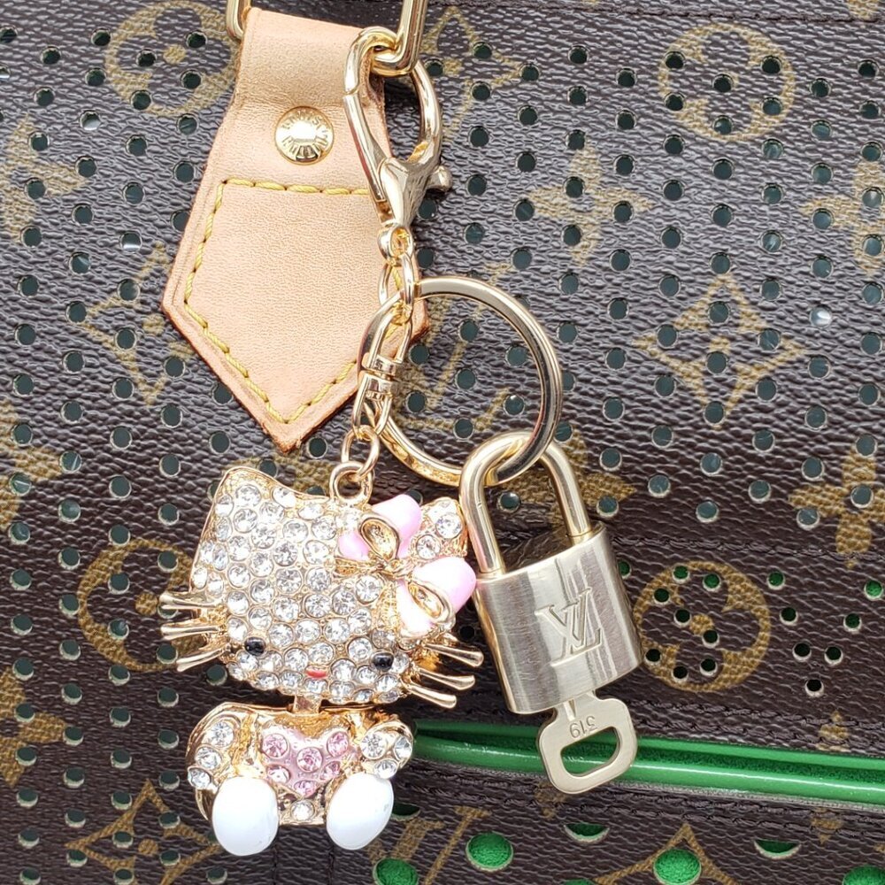 Louis Vuitton Gold Lock 🔒 Authentic LV Key + Unbranded Hello Kitty Bag Charm - Picture 7 of 8